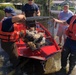 Coast Guard rescues owners, pets from floodwaters