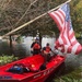 Coast Guard members search for hurricane victims