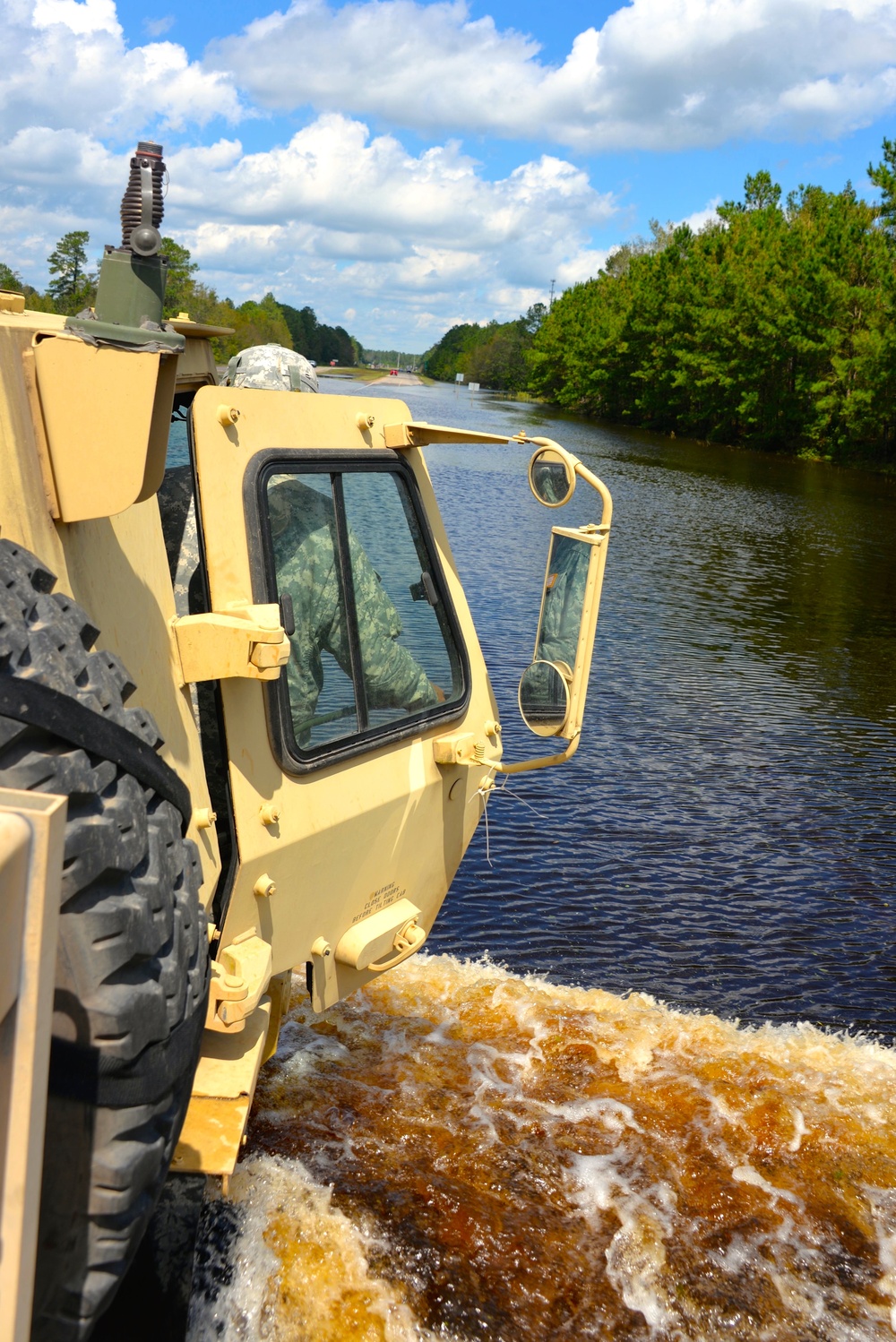 N.C. Guard Soldiers shuttle civilians across flooded waters during Hurricane Florence