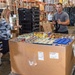Volunteers unload donations from DLA Land and Maritime at food bank
