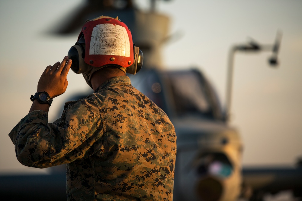 U.S. Marines Conduct Ordnance Loading &amp; Refueling Drills with AH-1 Helicopters