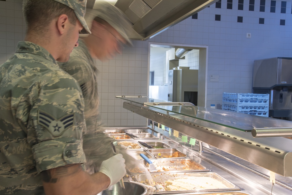 Airmen serve food at Ramstein Air Base