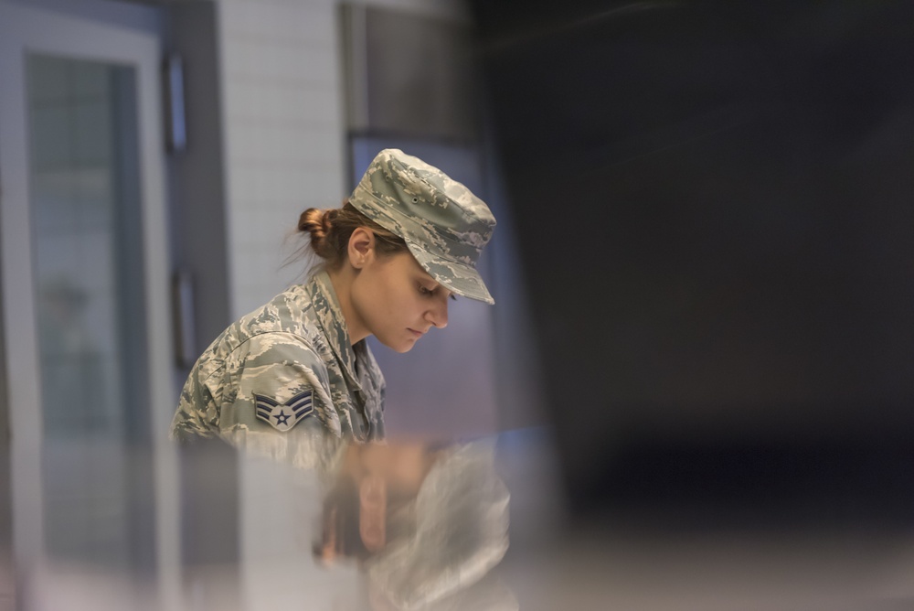 Airman prepares food at Ramstein AB dining facility