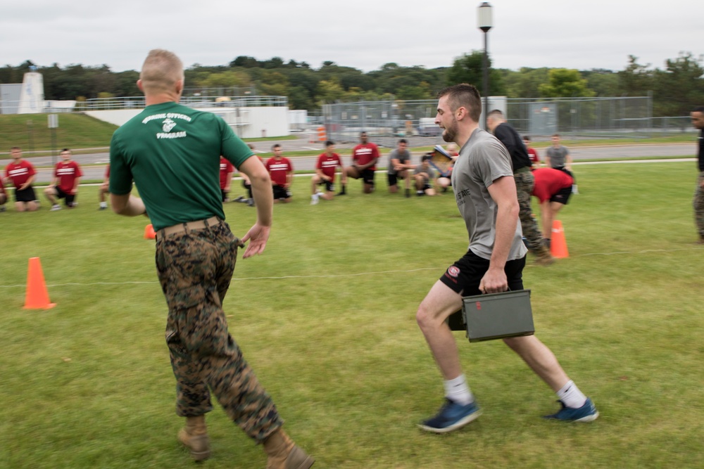 Digging deep; Marines train St. Cloud Wrestling Team to strive for greatness