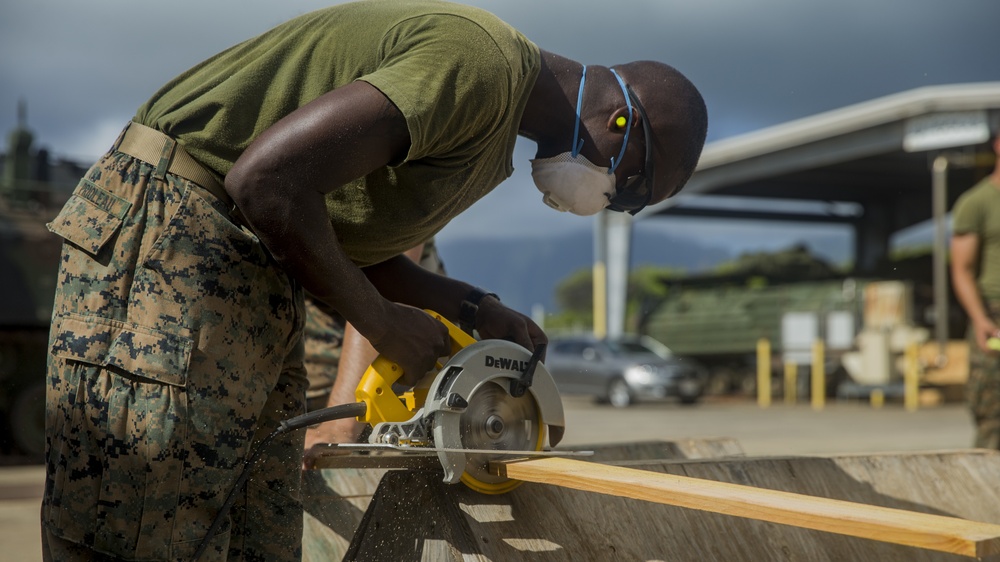 3rd Marine Regiment Combat Engineers make wooden crates