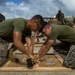 3rd Marine Regiment Combat Engineers make wooden crates