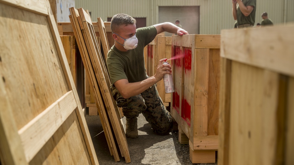 3rd Marine Regiment Combat Engineers make wooden crates