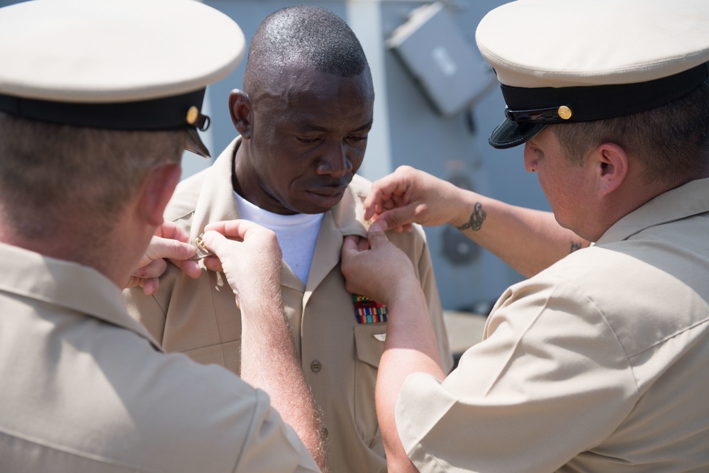 USS Jason Dunham (DDG 109) Sailor is frocked to Chief