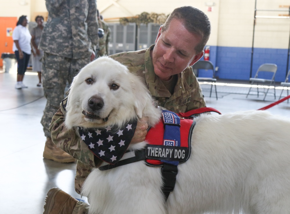 USO therapy dog visits with Soldiers responding to Hurricane Florence