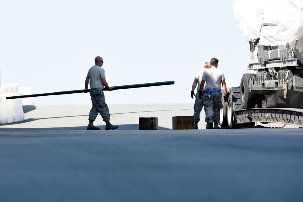 North Carolina Air National Guardsmen Recieve Back-Up Engine