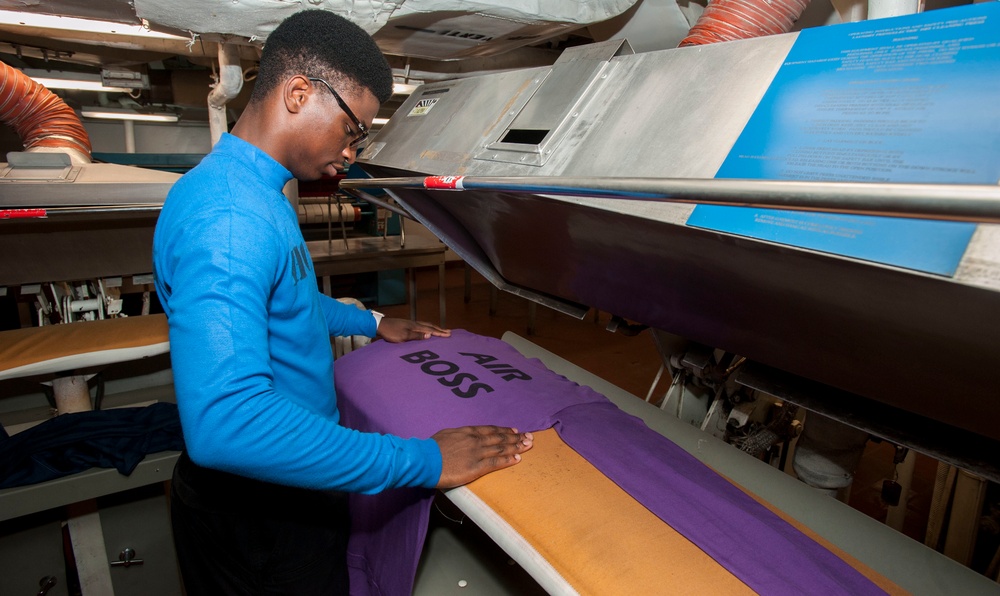 Sailors Wash Laundry Aboard GHWB