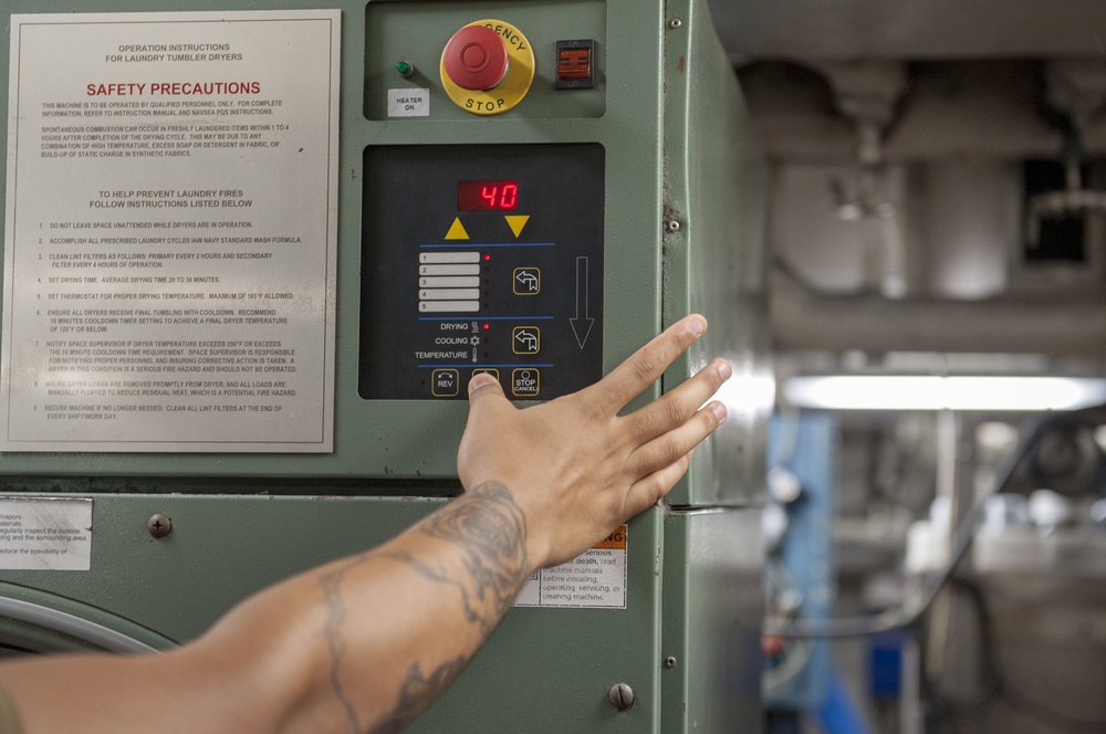 Sailors Wash Laundry Aboard GHWB