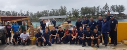 Guam Fire Department aboard USCGC Kiska bring typhoon relief supplies to Rota