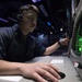 Sonar Technician 2nd Class Alberto Folch, from Hollywood, Fla., looks at a monitor in the comat information center of the Ticonderoga-class guided-missile cruiser USS Antietam (CG 54) during exercise Valiant Shield