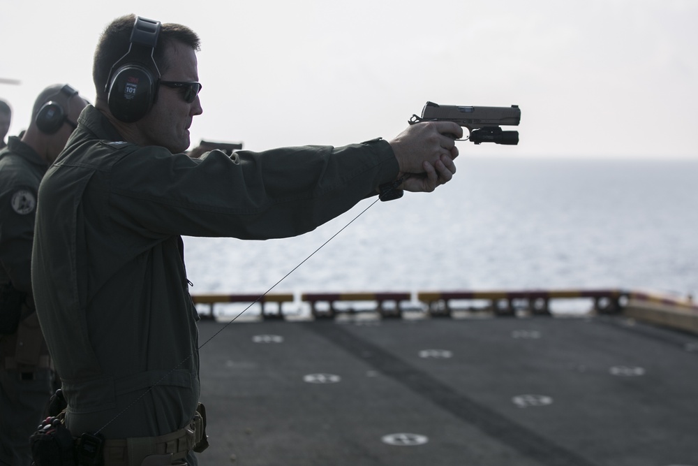 31st MEU ARP sharpen pistol marksmanship skills at sea