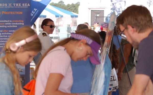 Visitors to NHHS STEM Booth during NAS Oceana Air Show