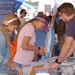 Visitors to NHHS STEM Booth during NAS Oceana Air Show