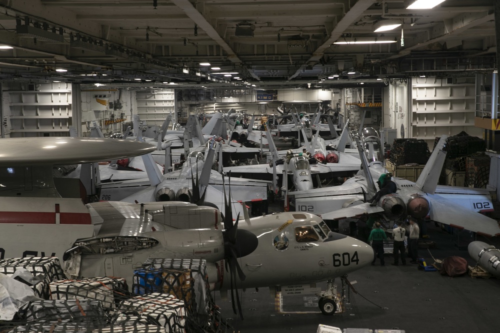 Sailors Perform Maintenance on Aircraft