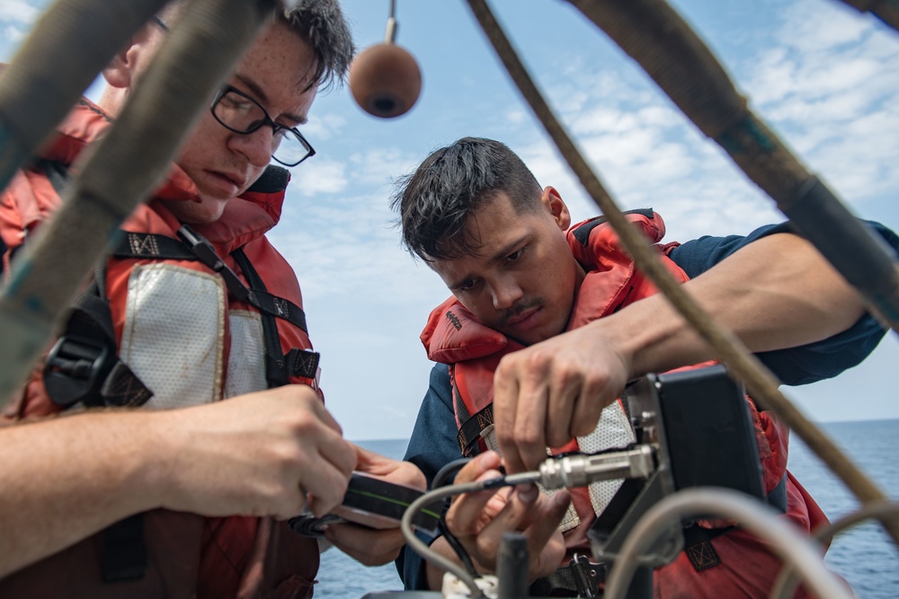 USS Jason Dunham ET's perform small boat maintenance