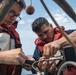 USS Jason Dunham ET's perform small boat maintenance