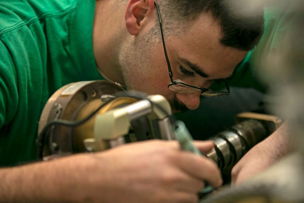 Aviation Fixes a Connection on a F/A-18F Super Hornet