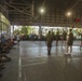 Service members and Barangay Pablicion Uno play basketball during KAMANDAG 2