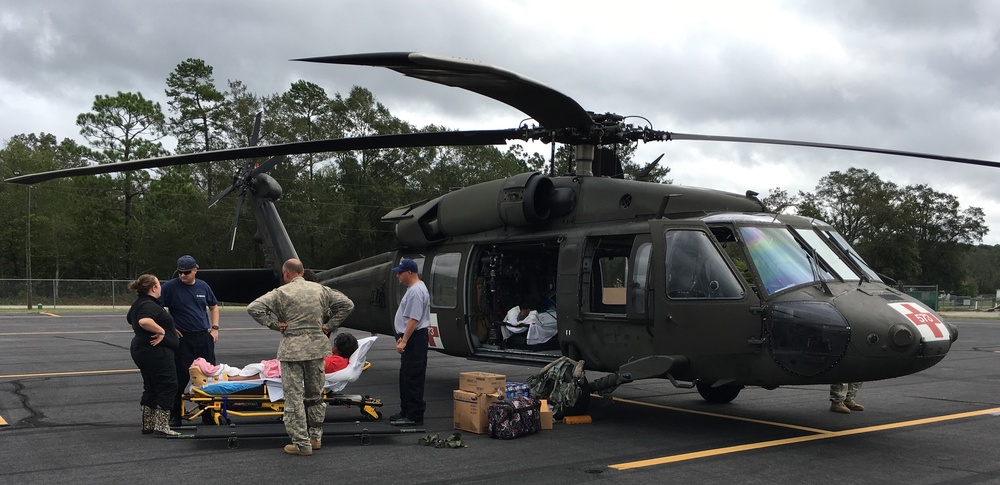 New York Army National Guard Soldiers from Company C 1st Battalion 171 GSAB conduct rescues in North Carolina