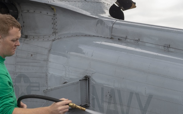 USS Bonhomme Richard (LHD 6) HSC 23 Counterparts perform maintenance on MH-60S