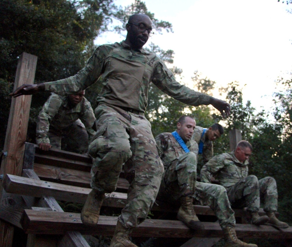 703rd crush Marne Mile obstacle course