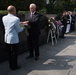 The Vice President, Secretary of the Interior and Deputy Secretary of Defense participate in a flag presentation ceremony