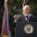 The Vice President, Secretary of the Interior and Deputy Secretary of Defense participate in a flag presentation ceremony