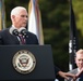 The Vice President, Secretary of the Interior and Deputy Secretary of Defense participate in a flag presentation ceremony