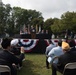 The Vice President, Secretary of the Interior and Deputy Secretary of Defense participate in a flag presentation ceremony