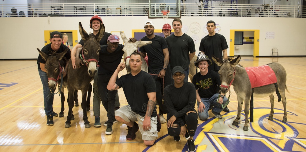 Airmen compete in donkey basketball tournament