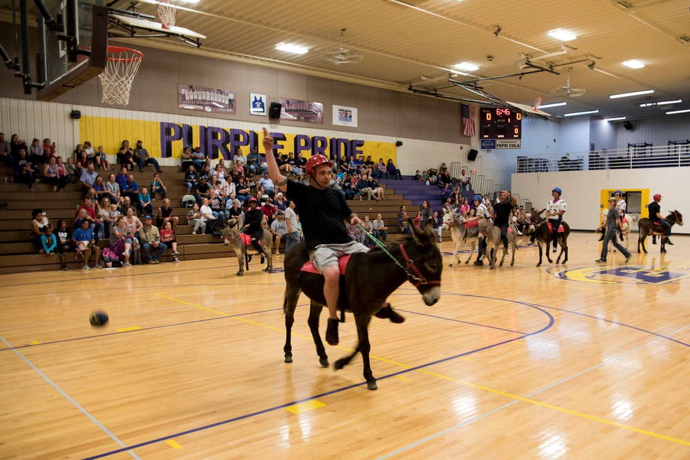 Airmen compete in donkey basketball tournament