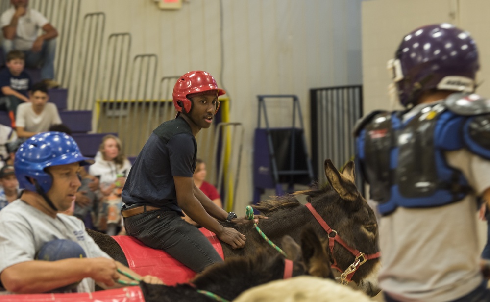 Airmen compete in donkey basketball tournament