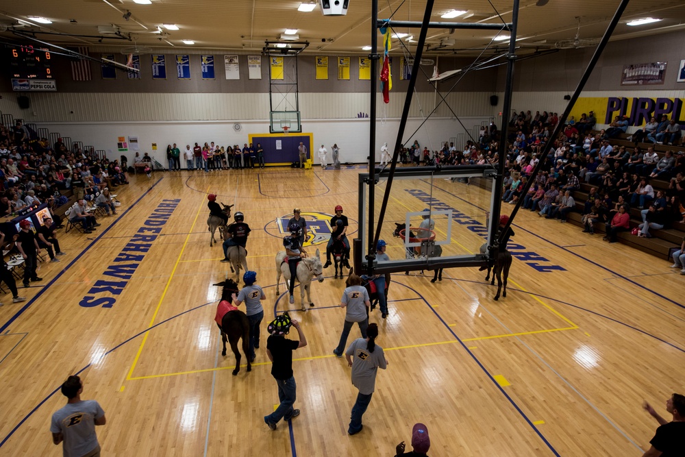 Airmen compete in donkey basketball tournament