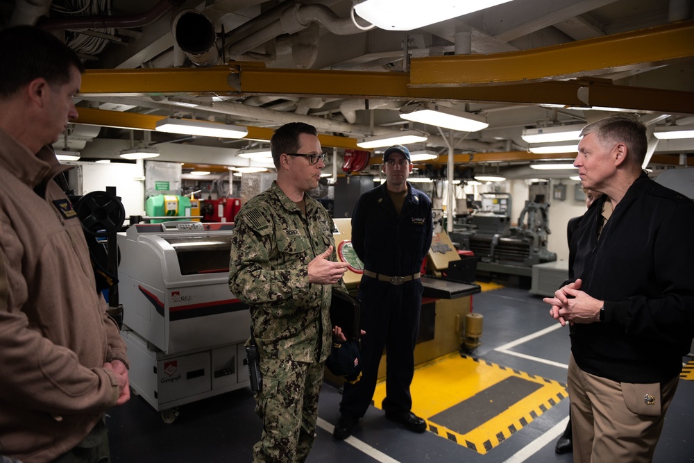 Cmdr. James Rorer, the Nimitz-class USS John C. Stennis’ (CVN 74) aircraft intermediate maintenance department officer, speaks with Rear Adm. Lorin Selby, Chief Engineer, Naval Sea Systems Command.