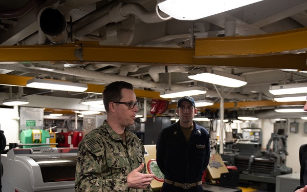 Cmdr. James Rorer, the Nimitz-class USS John C. Stennis’ (CVN 74) aircraft intermediate maintenance department officer, speaks with Rear Adm. Lorin Selby, Chief Engineer, Naval Sea Systems Command.