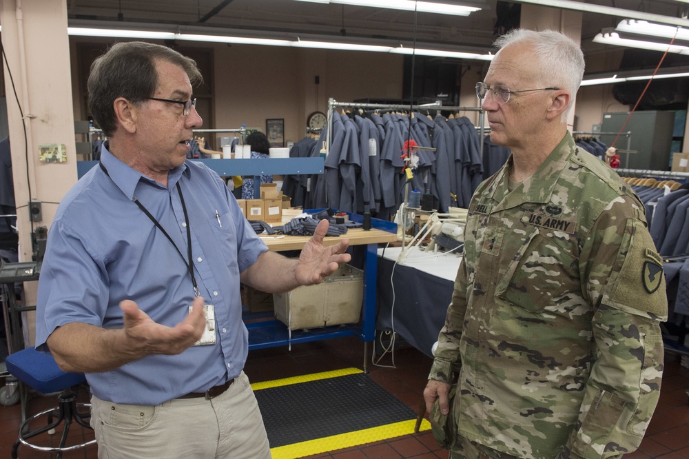 DISCUSSING OPERATIONS AT CADET UNIFORM FACTORY AT WEST POINT