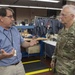 DISCUSSING OPERATIONS AT CADET UNIFORM FACTORY AT WEST POINT