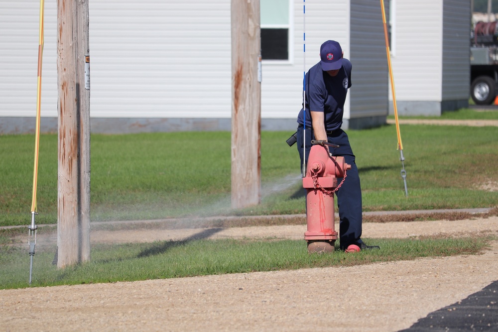 Fort McCoy firefighters flush hydrants around installation