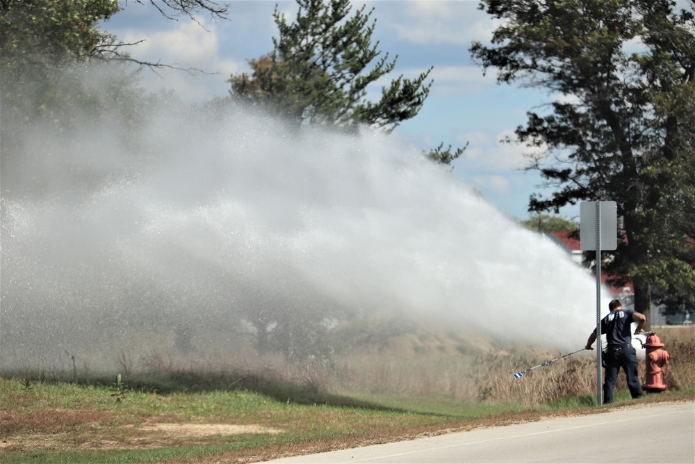 Fort McCoy firefighters flush hydrants around installation