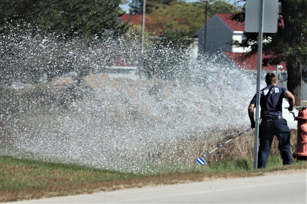 Fort McCoy firefighters flush hydrants around installation