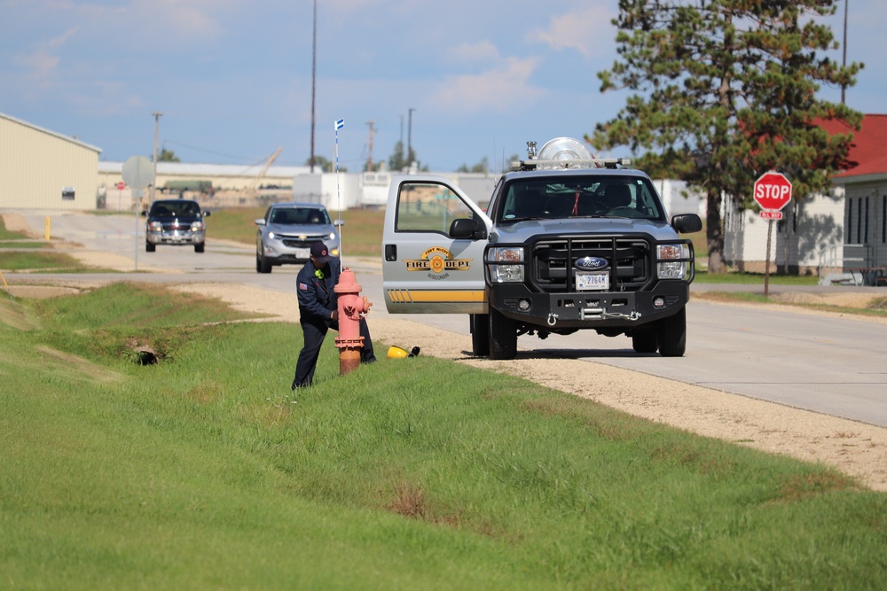 Fort McCoy firefighters flush hydrants around installation
