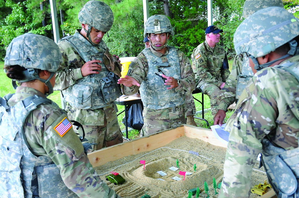 Warrant officer leads team of young Soldiers