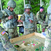 Warrant officer leads team of young Soldiers