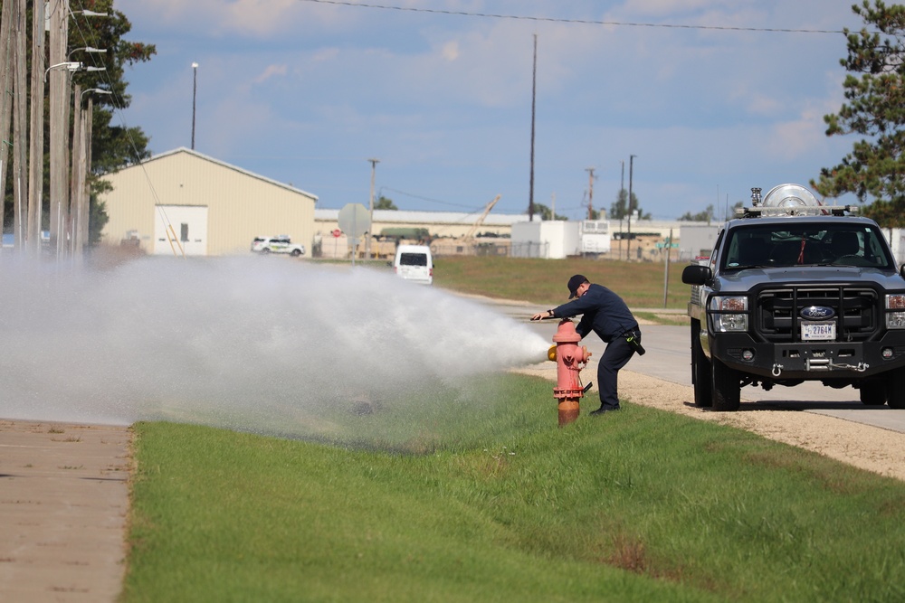 Fort McCoy firefighters flush hydrants around installation