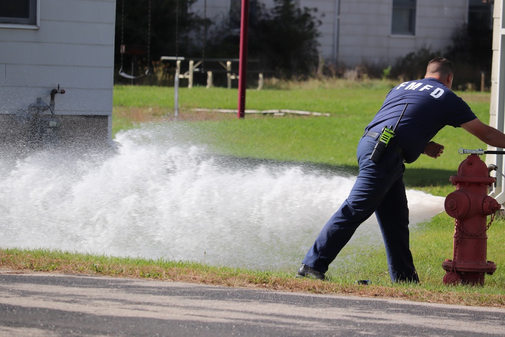 Fort McCoy firefighters flush hydrants around installation