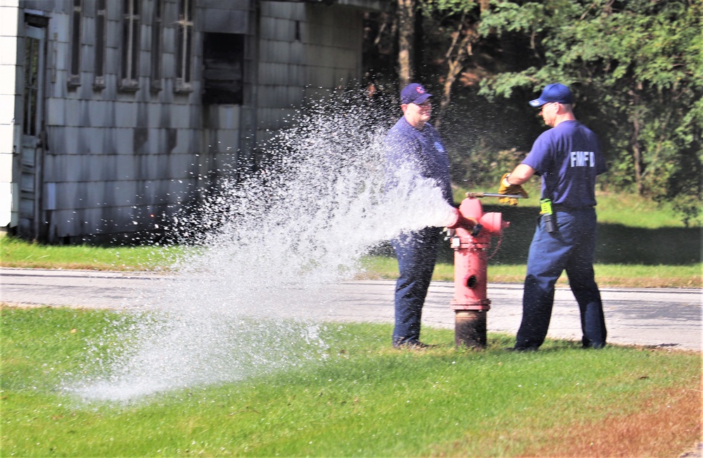 Fort McCoy firefighters flush hydrants around installation